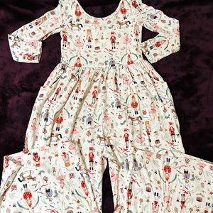 Sweet Honey leggy romper Nutcracker print